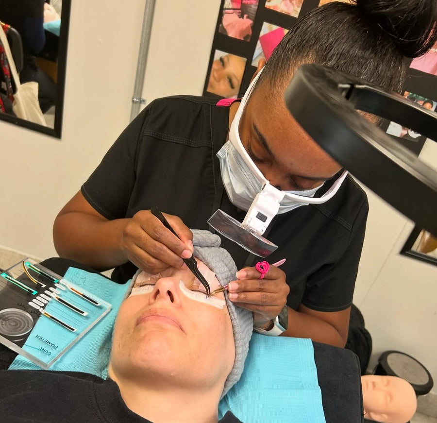 RLU graduate Courtney performing a lash service