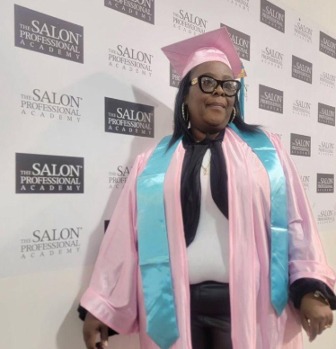 RLU graduate LaTiya at her esthetician graduation